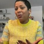 Tamron’s yellow tweed short sleeve sweater on Tamron Hall Show