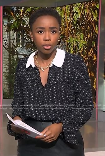 Zinhle’s black polka dot collared top on NBC News Daily