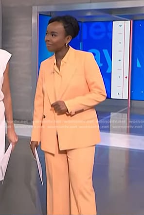 Zinhle’s orange blazer and wide leg pants on NBC News Daily