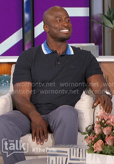Akbar’s blue polo shirt with blue collar on The Talk