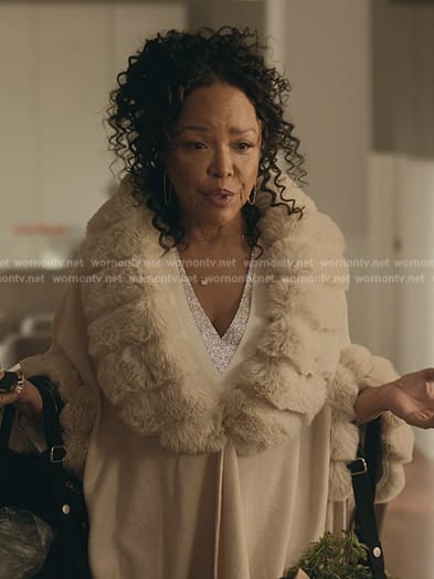 Alicia’s beige fur collar coat on The Chi