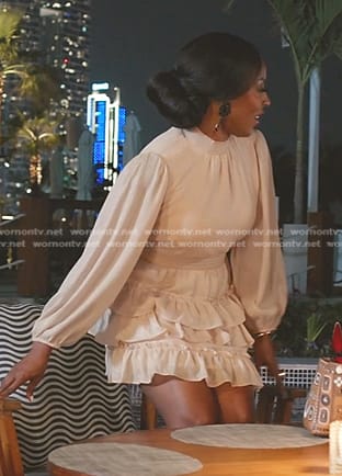 Caroline’s ivory tiered mini dress on The Real Housewives of Dubai