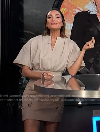 Courtney’s khaki crop top and mini skirt on E! News