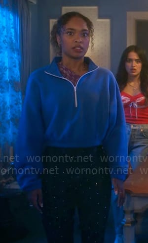 Faran’s blue quarter-zip sweatshirt on Pretty Little Liars Original Sin