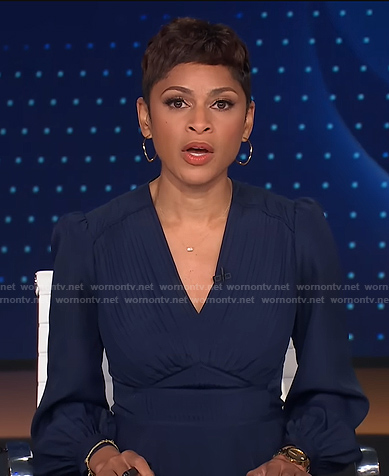 Jericka’s navy pleated v-neck dress on CBS Evening News