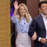 Kelly’s blue tie neck blouse and skirt on Live with Kelly and Mark