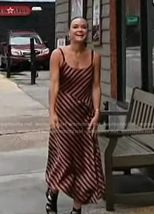 Lindsay Myers’ brown stripe dress on Access Hollywood