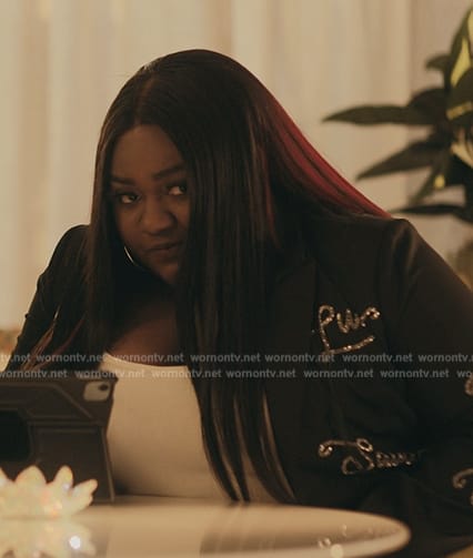 Maisha’s embellished black jacket on The Chi