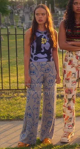 Mouse’s flower top and character print pants on Pretty Little Liars Original Sin
