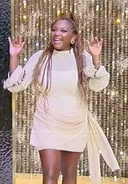 Naturi Naughton’s white mesh drape dress on Tamron Hall Show