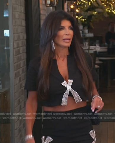 Teresa’s black crystal bow top and skirt on The Real Housewives of New Jersey