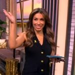 Alyssa’s black mini dress with gold buttons on The View