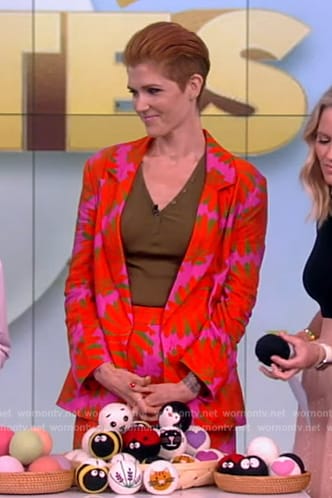 Ashley Alderfer Kaufman’s red floral print blazer and pants on The View