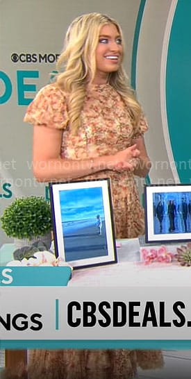 Ashley Bellman’s orange printed short sleeve midi dress on CBS Mornings