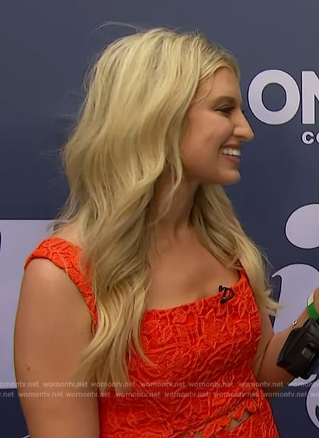 Ashley Bellman’s red floral lace top and skirt on E! News
