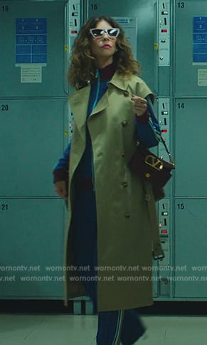 Carmen’s brown leather bag and blue tracksuit on Elite
