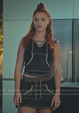 Chloe’s gray lace-up detail top and skirt on Elite