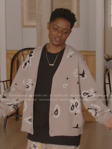 Coop’s beige paisley print cardigan and shorts on All American