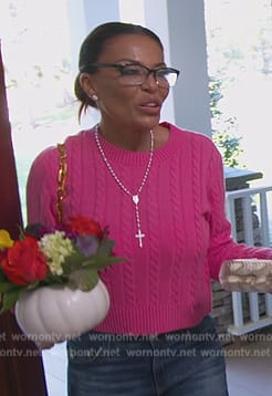 Dolores’s pink cable knit sweater on The Real Housewives of New Jersey