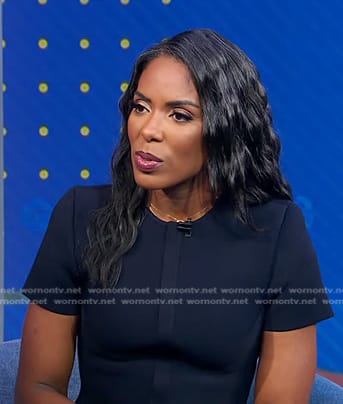 Dr. Jessica Shepherd’s navy peplum top on Good Morning America