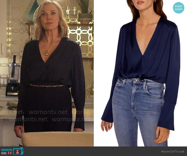 Favorite Daughter Surplice Long Sleeve Satin Bodysuit worn by Nadine Gregory (Brenda Strong) on UnPrisoned