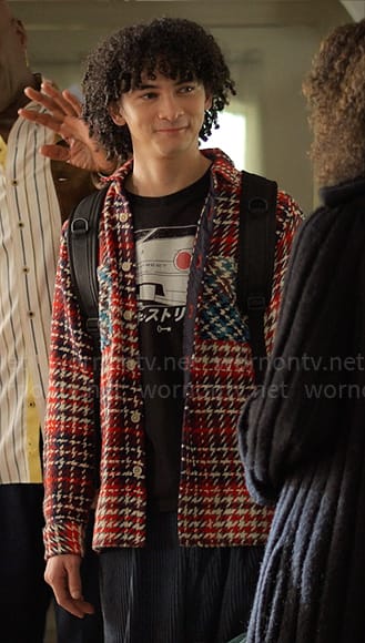 Finn’s red houndstooth shirt jacket on UnPrisoned