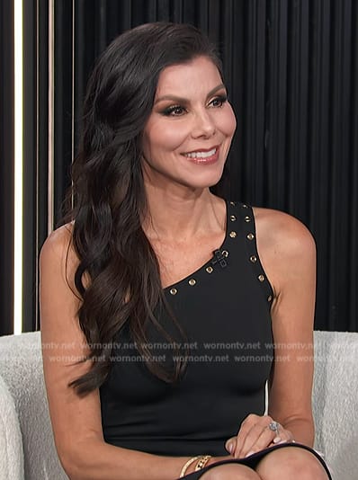 Heather Dubrow’s black grommet one shoulder dress on E! News