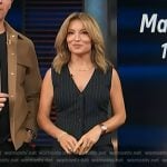 Kit’s navy pinstripe vest and skirt on Access Hollywood