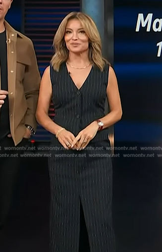 Kit’s navy pinstripe vest and skirt on Access Hollywood