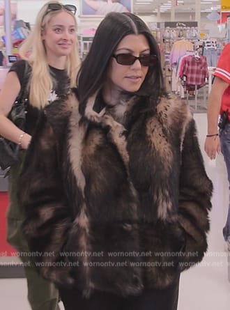 Kourtney’s brown fur jacket on The Kardashians