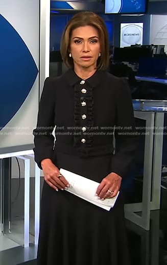 Kristine Johnson’s black ruffle button front dress on CBS Evening News