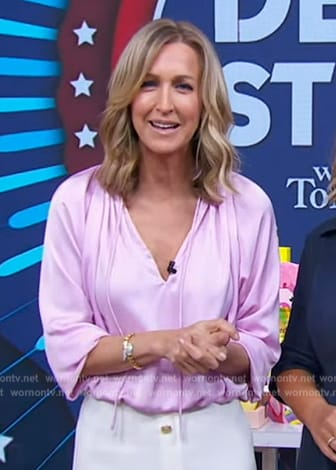Lara’s pink blouse and white button front skirt on Good Morning America