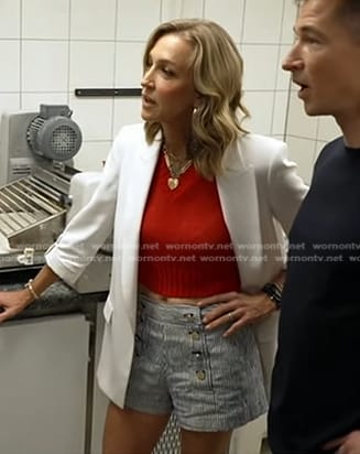Lara’s white roll-up sleeve jacket and striped shorts on Good Morning America