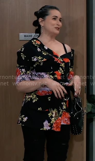 Lois’ black floral print off-shoulder jacket on General Hospital