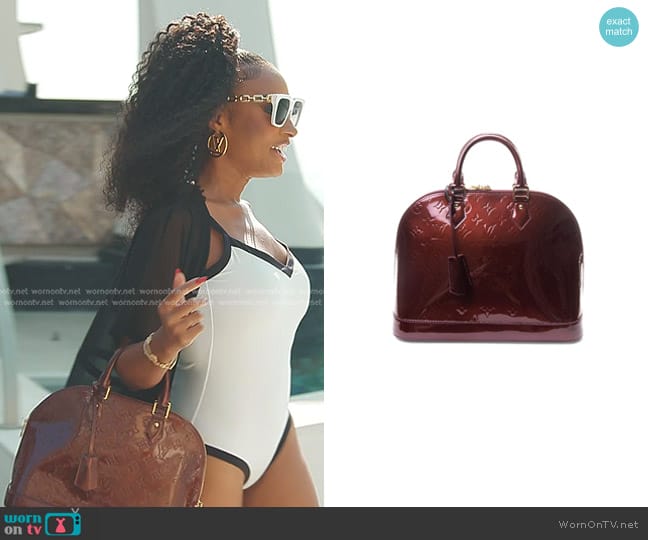 Louis Vuitton Alma PM Vernis Leather Top Handle Bag in Rouge worn by Lesa Milan (Lesa Milan) on The Real Housewives of Dubai