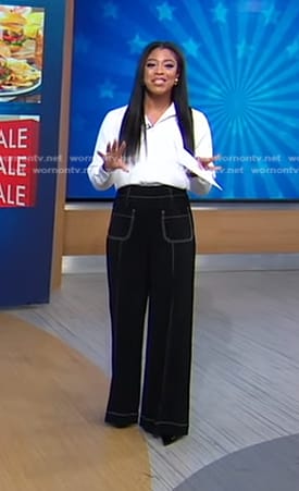 Morgan’s black wide-leg pants with white stitching on Good Morning America