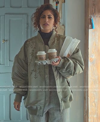 Nadia’s green floral bomber jacket on Elite