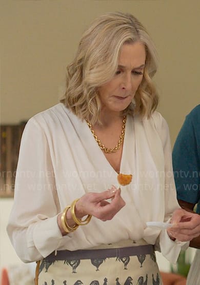 Nadine’s white draped blouse on UnPrisoned