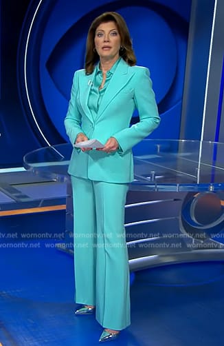 Norah’s light blue suit and satin blouse on CBS Evening News