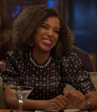 Paige’s navy star print dress on UnPrisoned