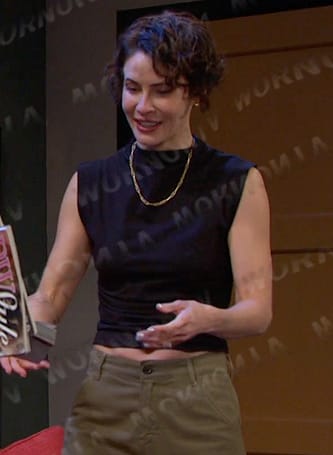 Sarah’s black mock neck top on Days of our Lives