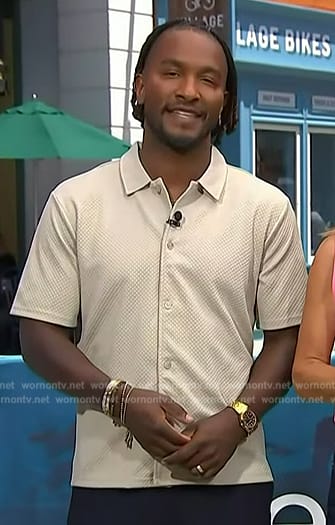 Scott’s beige textured polo on Access Hollywood