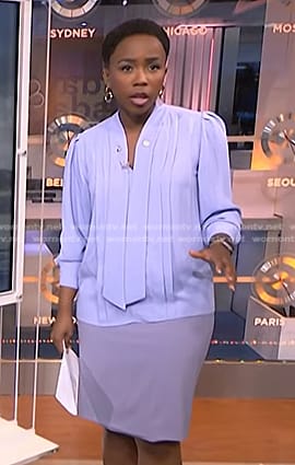 Zinhle’s lavender tie neck blouse and skirt on NBC News Daily