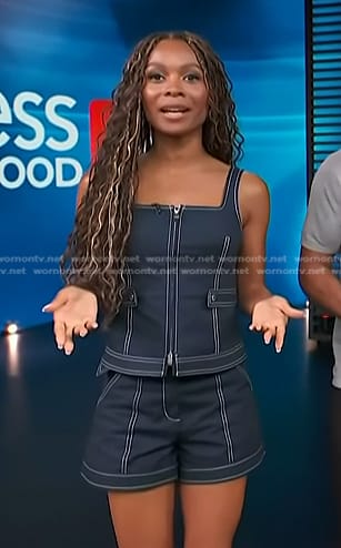 Zuri’s navy contrast stitching top and shorts on Access Hollywood