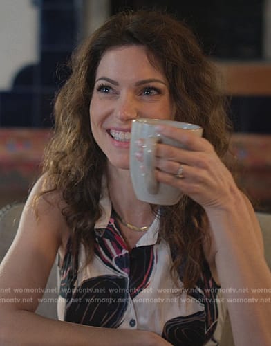 Amanda’s white floral print dress on Cobra Kai