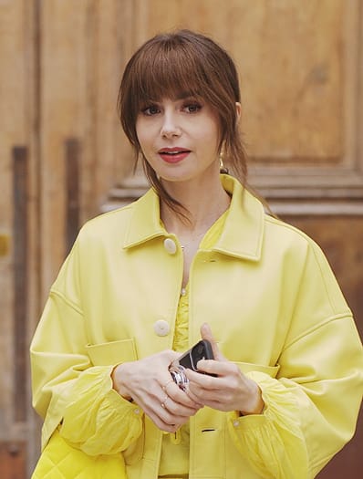 Emily’s yellow ruffle blouse and jacket on Emily in Paris