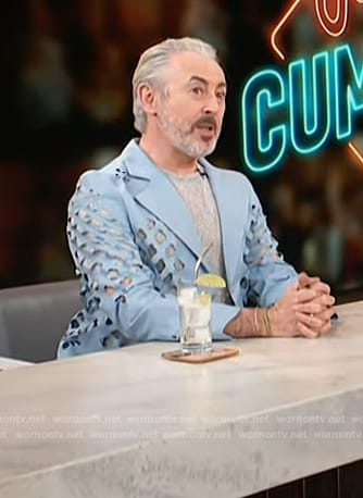 Alan Cummings’ blue laser cut blazer and pants on Access Hollywood