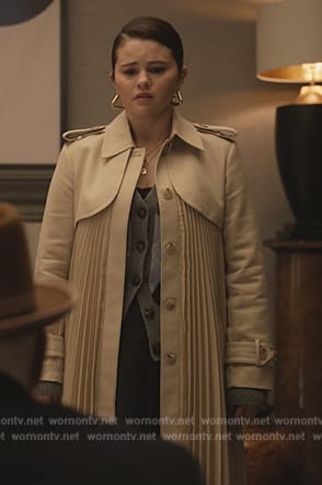 Mabel’s pleated trench coat and cardigan on Only Murders in the Building