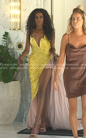 Chanel’s gold and pink asymmetric dress on The Real Housewives of Dubai