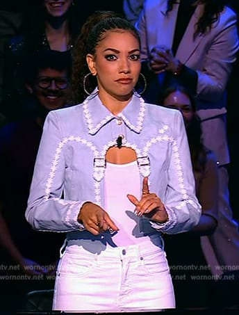 Corinne’s blue cutout denim jacket on Beat Shazam